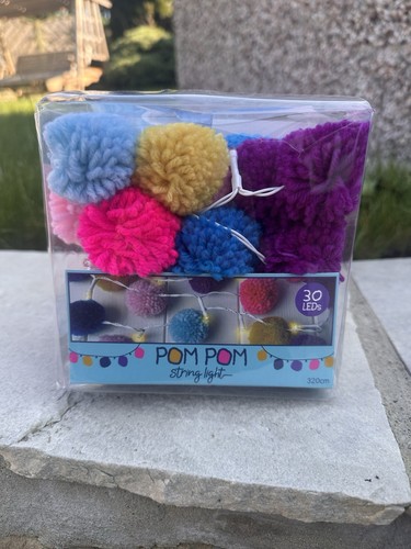 Multi pom string lights - string,